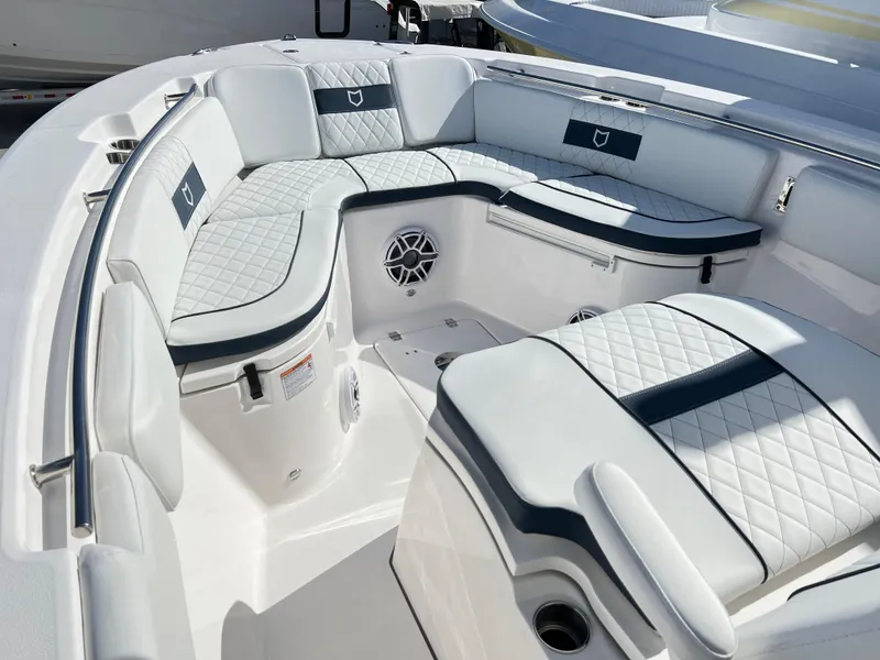 Slide: The Image of 2025 Sea Fox 288 Commander boat interior with cushioned seating and modern design. - 23