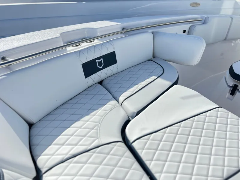 Slide: The Image of Luxurious seating on 2025 Sea Fox 288 Commander boat with quilted upholstery. - 26