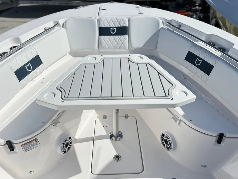 Slide: The Image of 2025 Sea Fox 288 Commander boat interior with seating and table. - 29