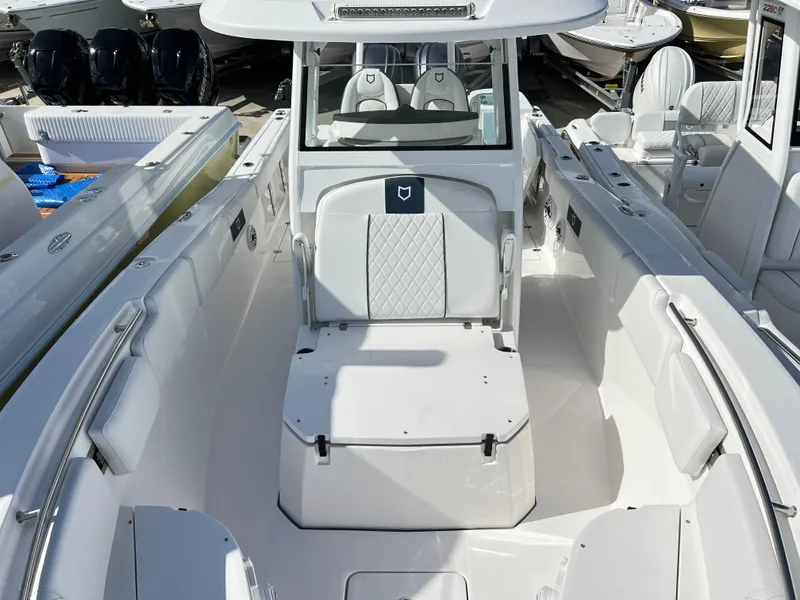 Slide: The Image of 2025 Sea Fox 288 Commander boat interior, featuring spacious seating and modern design. - 32