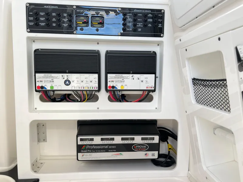 Slide: The Image of Electrical panel of 2025 Sea Fox 288 Commander boat with battery chargers and controls. - 37