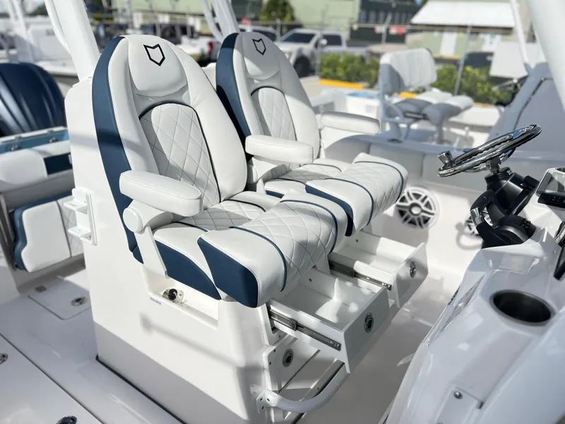Slide: The Image of Luxury seating on 2025 Sea Fox 288 Commander boat, featuring plush, diamond-stitched upholstery. - 42