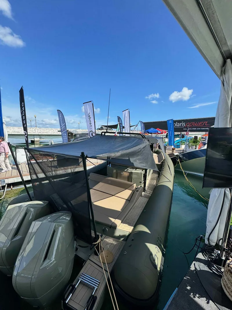 Slide: The Image of 2024 G-Tender DIECI boat docked at marina under clear blue sky. - 18