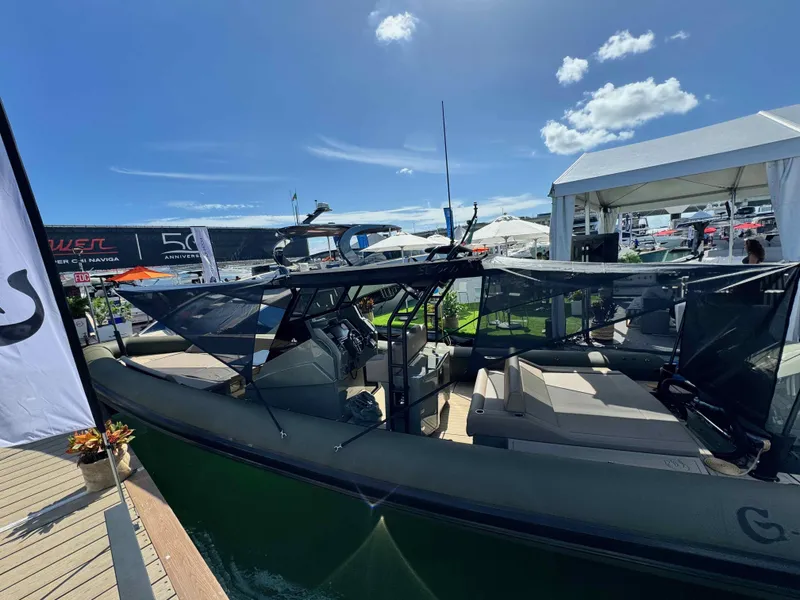 Slide: The Image of 2024 G-Tender DIECI boat displayed at a marina under a clear blue sky. - 19