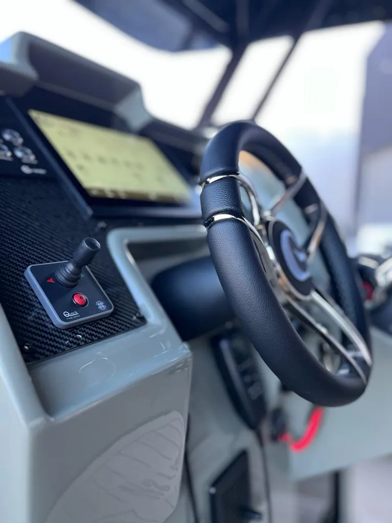 Slide: The Image of 2024 G-Tender DIECI boat cockpit with steering wheel and control panel. - 30