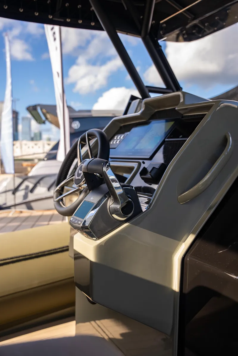 Slide: The Image of 2024 G-Tender DIECI boat dashboard with modern steering and controls. - 31