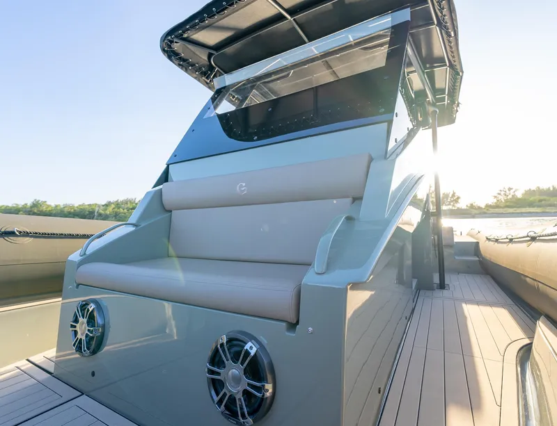 Slide: The Image of 2024 G-Tender DIECI boat with sleek design and modern seating on deck. - 36