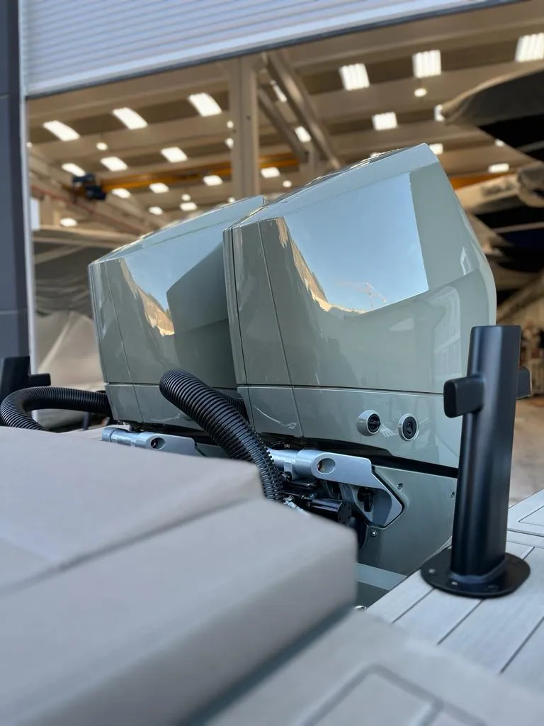 Slide: The Image of 2024 G-Tender DIECI boat engines in a modern showroom setting. - 40