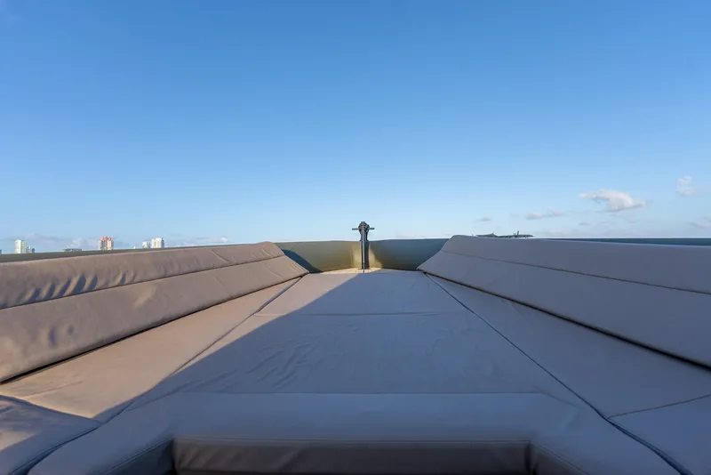 Slide: The Image of Luxurious 2024 G-Tender DIECI boat deck with cushioned seating under clear blue sky. - 45