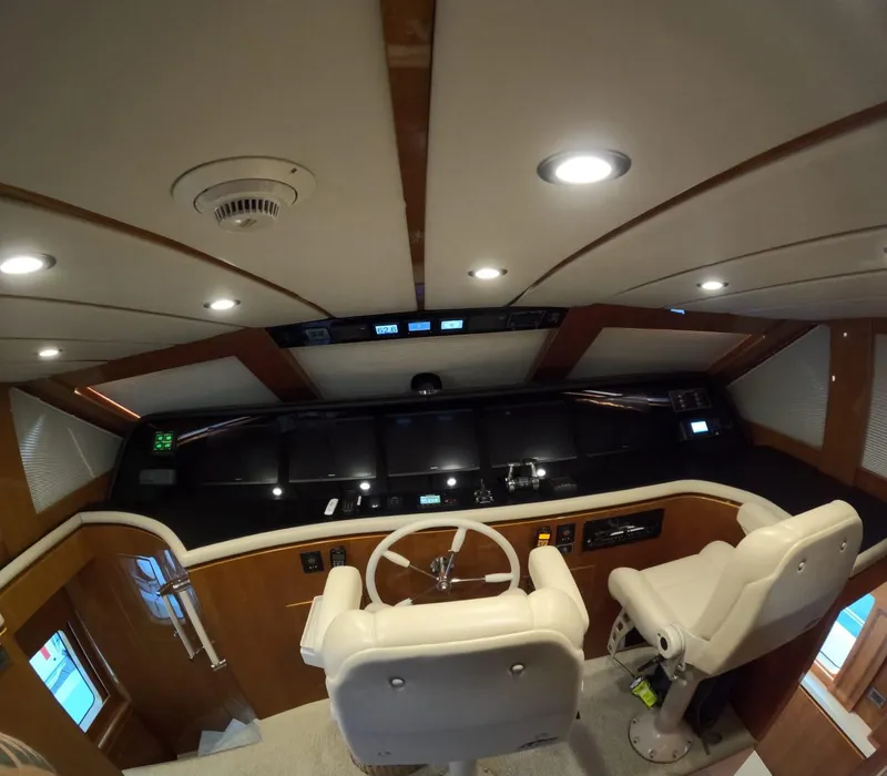 Slide: The Image of Interior helm of 2007 Hargrave 93' yacht with modern controls and seating. - 25