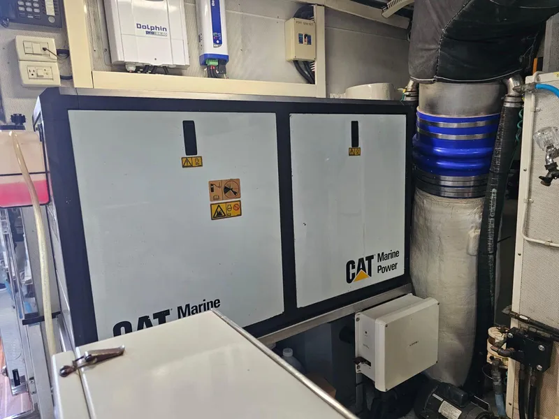 Slide: The Image of CAT Marine Power equipment in a 2007 Hargrave 93' yacht engine room. - 38