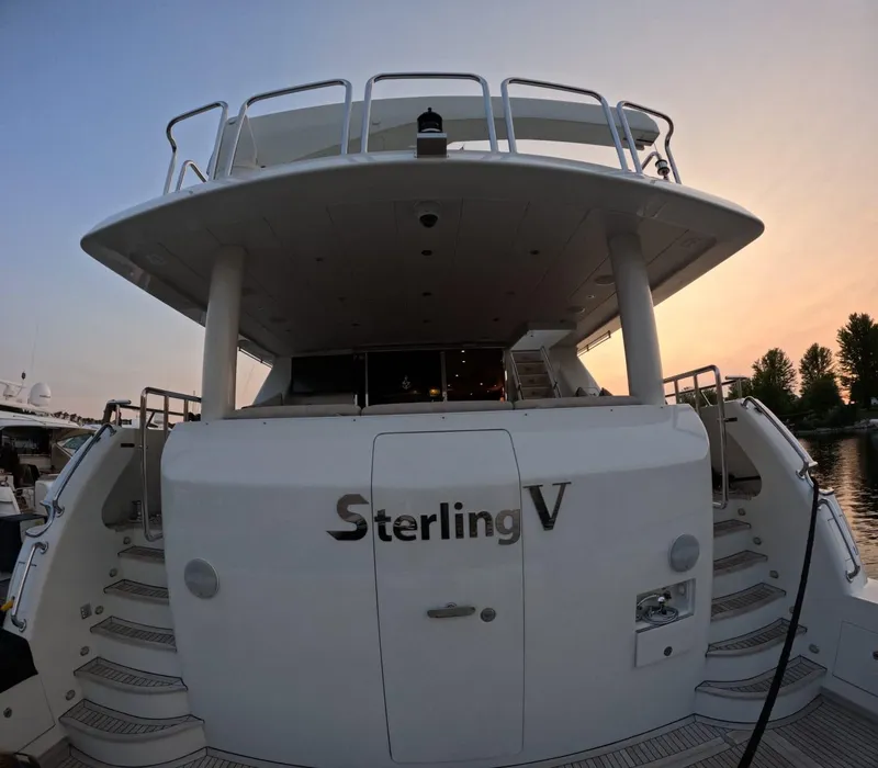 Slide: The Image of Hargrave 93' yacht, 2007 model, named Sterling V, docked at sunset. - 9