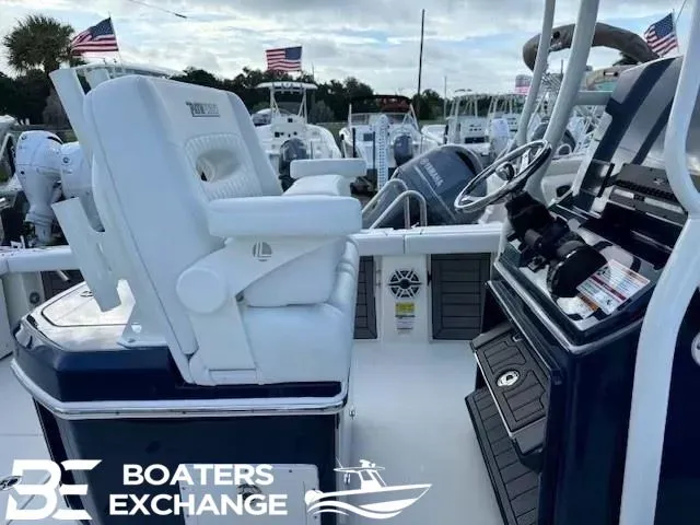 Slide: The Image of Pathfinder 2400 Open 2025 boat with helm and seating, Boaters Exchange. - 7