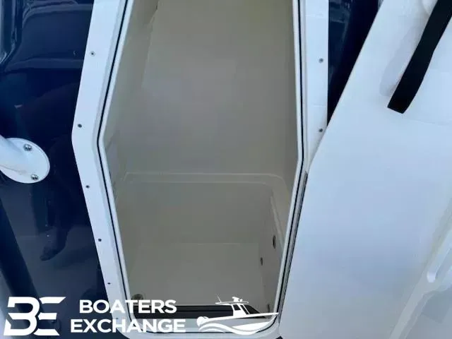 Slide: The Image of Pathfinder 2400 Open 2025 boat hatch, Boaters Exchange logo visible. - 9