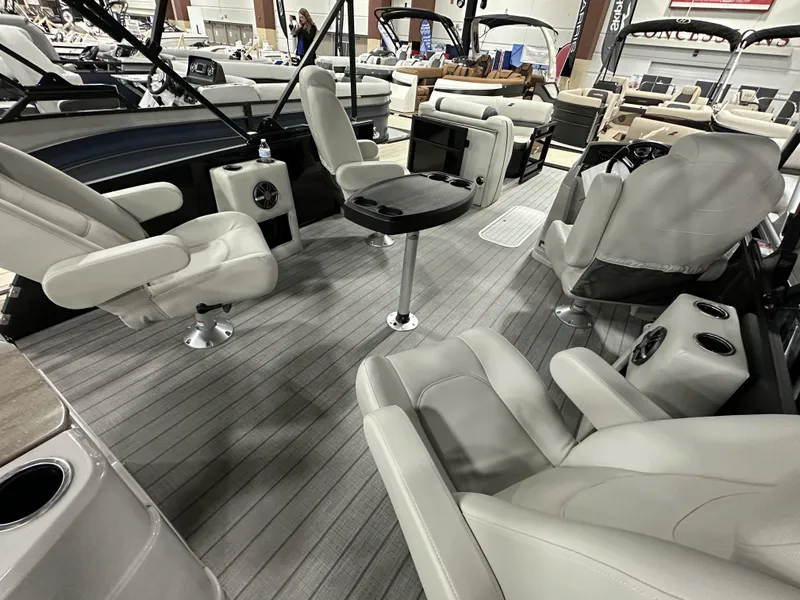 Slide: The Image of 2024 Starcraft EXS 3 HB4TT boat interior with luxurious seating and modern design. - 10