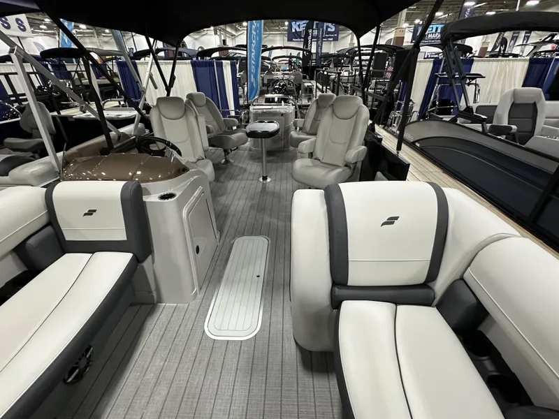 Slide: The Image of 2024 Starcraft EXS 3 HB4TT pontoon boat interior with luxurious seating and modern design. - 16