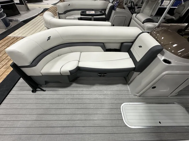 Slide: The Image of 2024 Starcraft EXS 3 HB4TT boat interior with plush seating and modern design. - 5