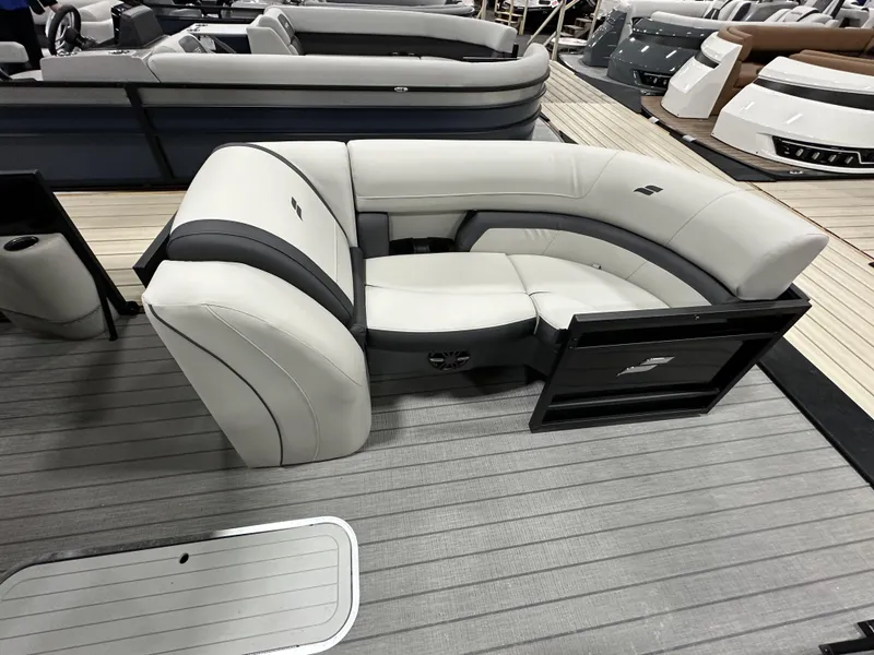 Slide: The Image of 2024 Starcraft EXS 3 HB4TT boat interior with sleek, modern seating design. - 6
