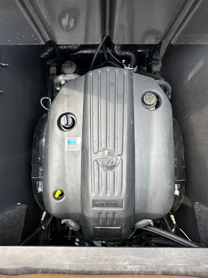 Slide: The Image of 2023 Axis T250 engine compartment, showcasing a modern marine engine design. - 17