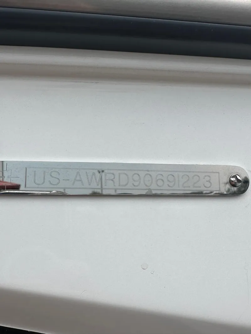 Slide: The Image of 2023 Axis T250 boat identification plate with serial number. - 20