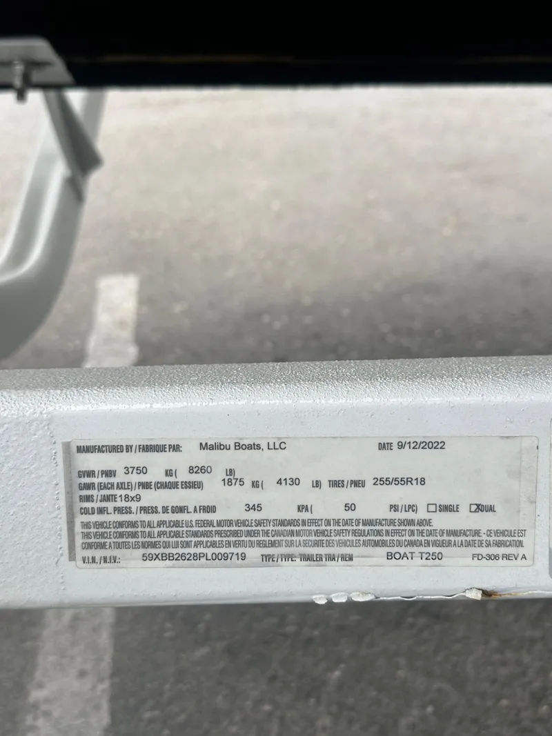 Slide: The Image of Label on Axis T250 boat trailer, manufactured by Malibu Boats, LLC, dated 9/12/2022. - 21