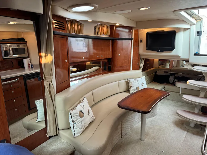 Slide: The Image of Luxurious 2007 Sea Ray 340 Sundancer interior with elegant seating and modern amenities. - 20