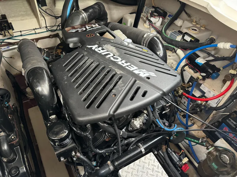 Slide: The Image of Engine compartment of a 2007 Sea Ray 340 Sundancer boat, featuring a MerCruiser engine. - 27