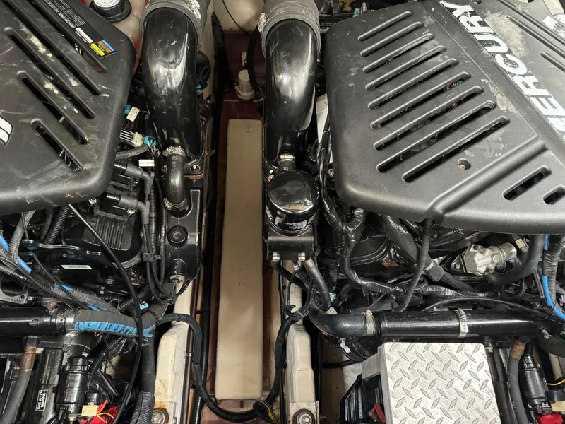 Slide: The Image of Engine compartment of a 2007 Sea Ray 340 Sundancer with dual Mercury engines. - 29