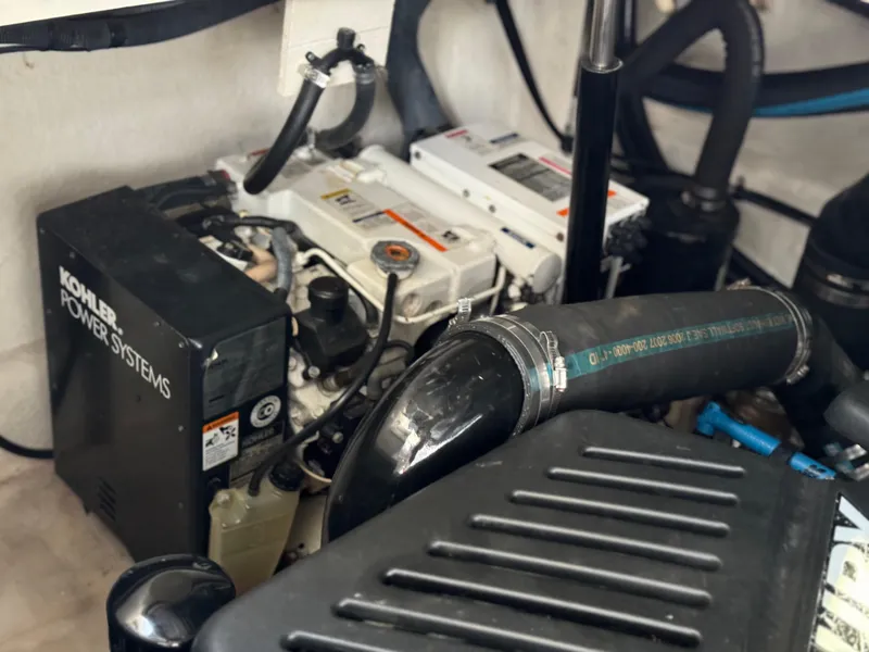 Slide: The Image of Engine room of 2007 Sea Ray 340 Sundancer with Kohler power systems. - 31