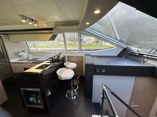 Slide: The Image of Port Side Galley and Bar - 35