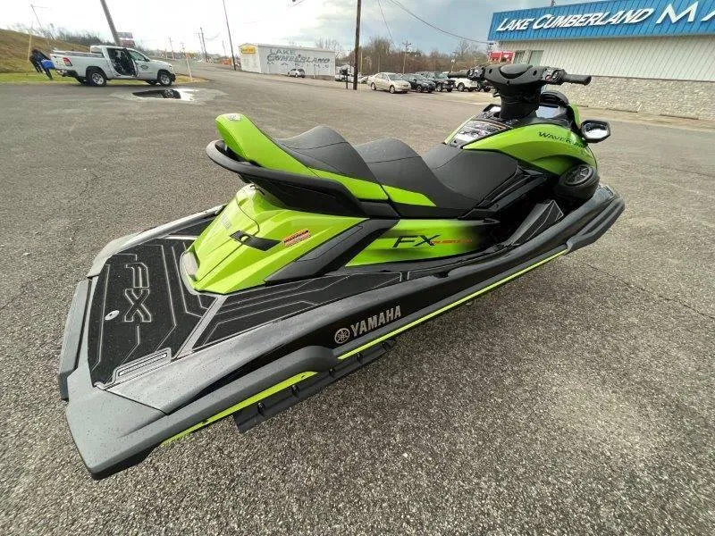 Slide: The Image of 2024 Yamaha Waverunner FX Cruiser SVHO with Audio System, lime green, parked outdoors. - 13