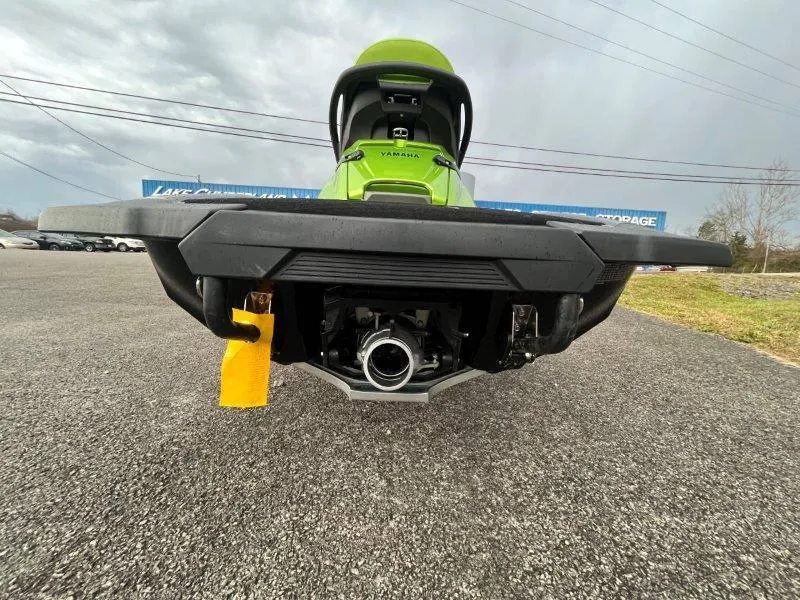 Slide: The Image of 2024 Yamaha Waverunner FX Cruiser SVHO rear view on asphalt, showcasing audio system. - 14