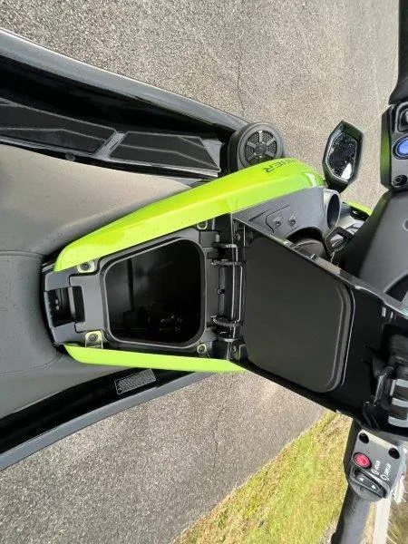 Slide: The Image of 2024 Yamaha Waverunner FX Cruiser SVHO storage compartment open, showcasing sleek design and audio system. - 22