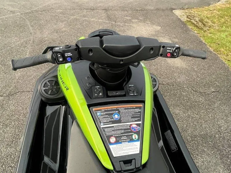 Slide: The Image of 2024 Yamaha Waverunner FX Cruiser SVHO with audio system, green handlebars view. - 29