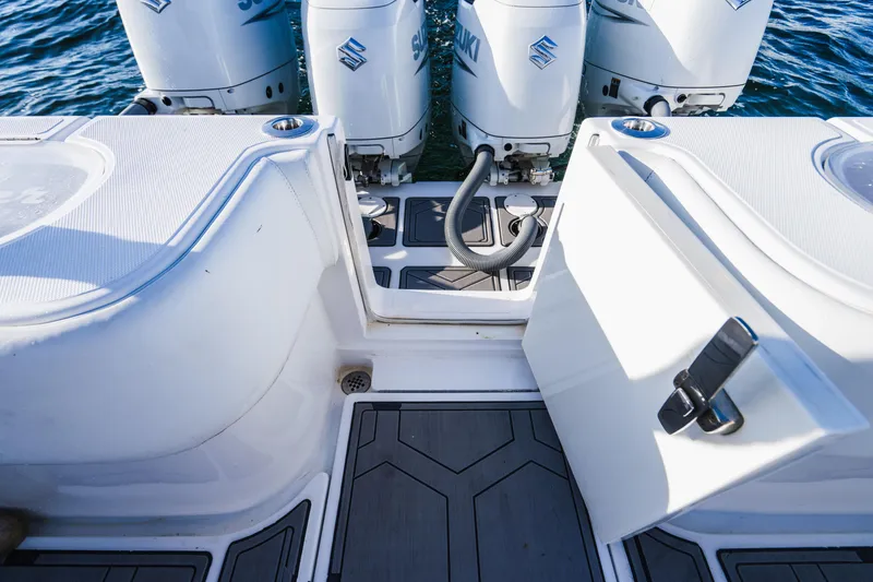 Slide: The Image of 2018 SeaHunter 39 Tournament boat with Suzuki outboard engines on the water. - 24