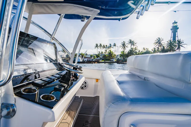 Slide: The Image of 2018 SeaHunter 39 Tournament boat interior with ocean view and lighthouse. - 43