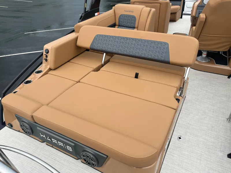 Slide: The Image of 2025 Harris Solstice 230 boat with tan seating and modern design. - 9