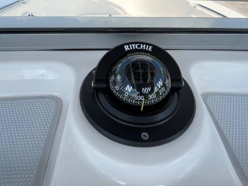 Slide: The Image of Ritchie compass on 2024 Robalo R180 boat dashboard. - 34