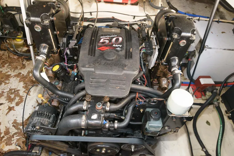 Slide: The Image of Engine of 2008 Sea Ray 240 Sundancer boat, featuring MerCruiser 5.0 MPI. - 16