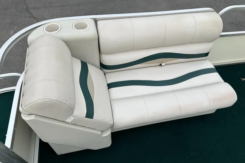 Slide: The Image of White and green boat seating with cup holders, Sea Hunt 20, 2001 model. - 9