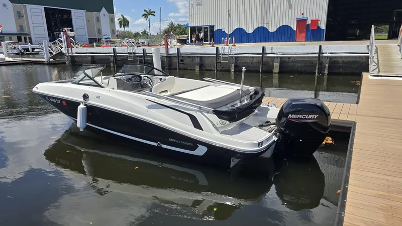 Slide: The Image of 2021 Bayliner VR5 Bowrider OB docked with Mercury outboard engine. - 0