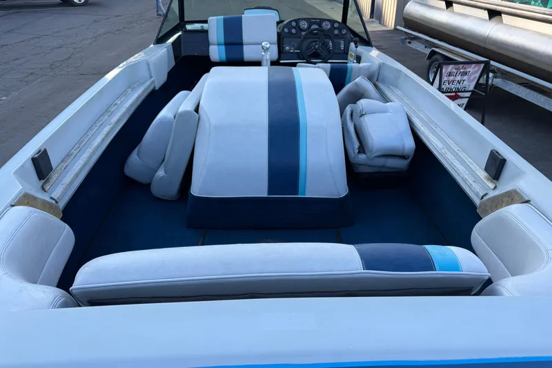 Slide: The Image of 1989 Correct Craft Ski Nautique interior with blue and white upholstery. - 13