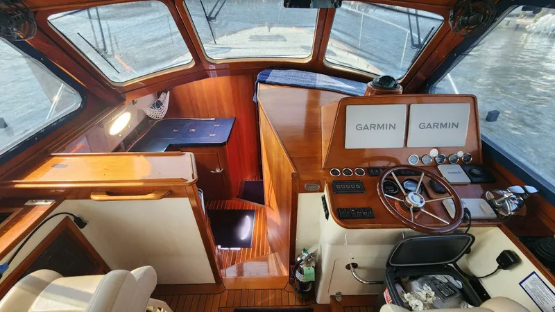Slide: The Image of Interior of 2002 Hinckley Talaria 44 FB yacht with Garmin navigation system. - 6