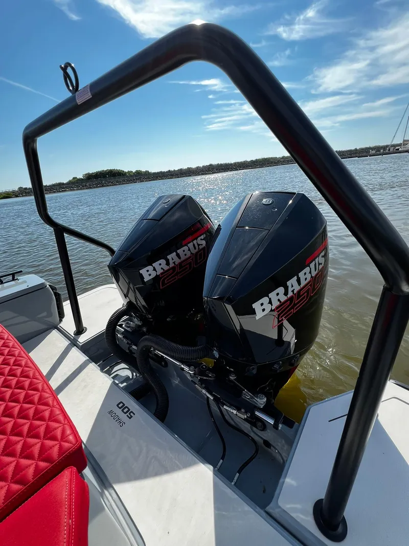 Slide: The Image of 2022 BRABUS Shadow 500 Cabin boat with dual engines on a sunny day. - 12