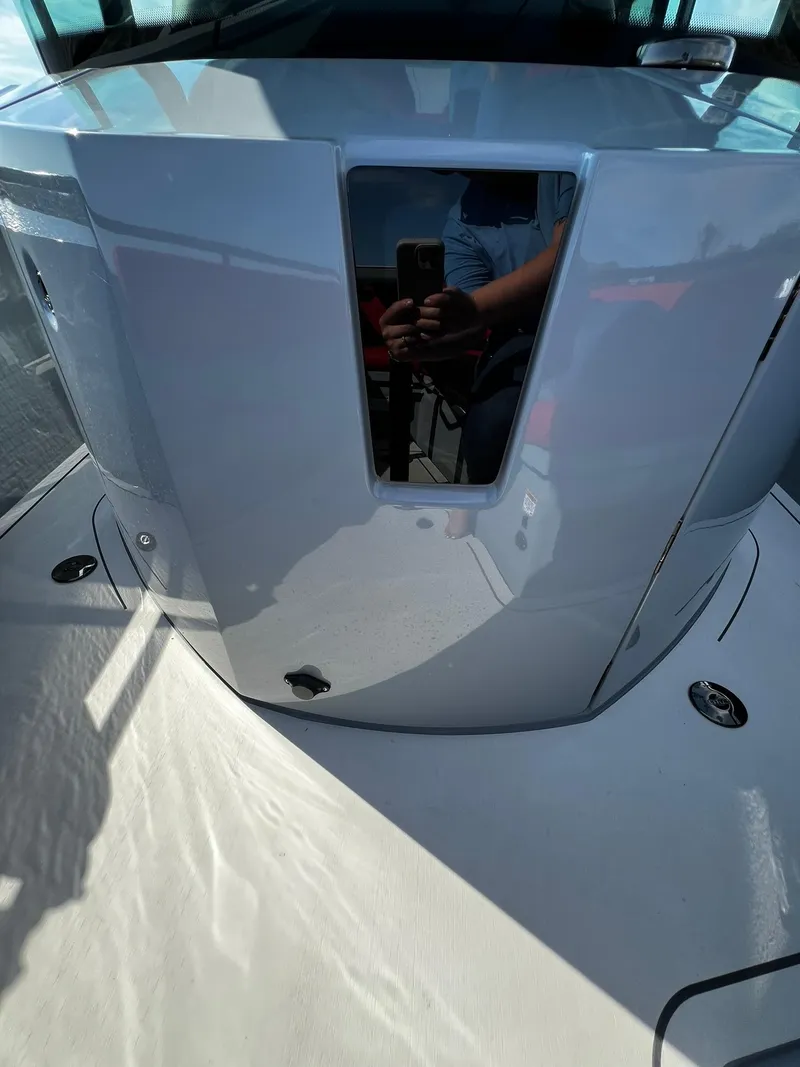 Slide: The Image of 2022 BRABUS Shadow 500 Cabin, sleek design, reflective surface, modern luxury boat. - 22