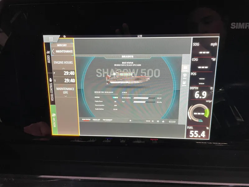 Slide: The Image of BRABUS Shadow 500 Cabin 2022 dashboard display showing engine hours and fuel level. - 28