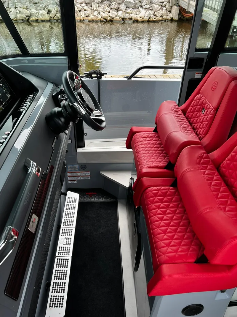 Slide: The Image of 2022 BRABUS Shadow 500 Cabin interior with red quilted seats and steering wheel. - 35