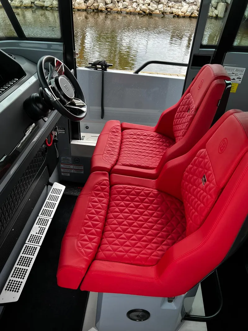 Slide: The Image of 2022 BRABUS Shadow 500 Cabin interior with red quilted seats and steering wheel. - 36