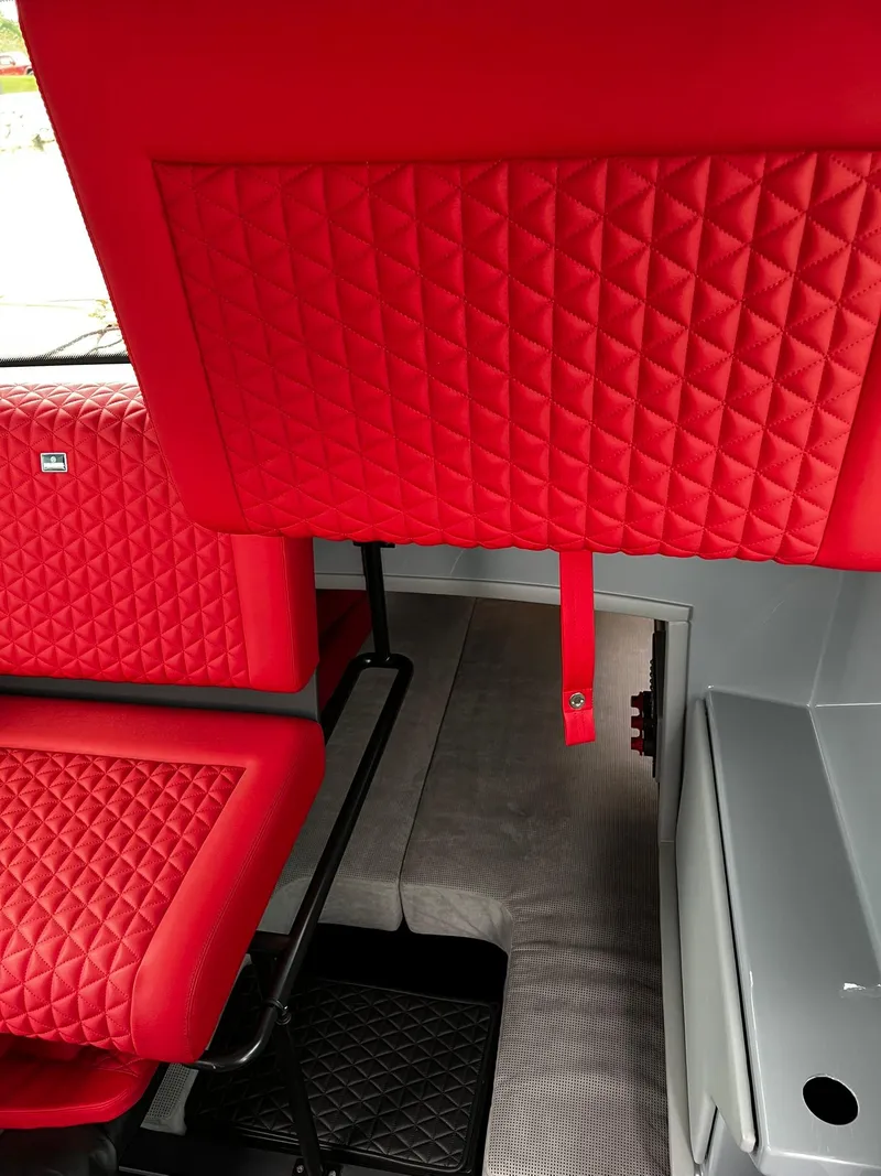 Slide: The Image of Interior of 2022 BRABUS Shadow 500 Cabin with red quilted seats. - 44