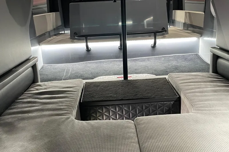 Slide: The Image of 2022 BRABUS Shadow 500 Cabin interior with modern seating and ambient lighting. - 48